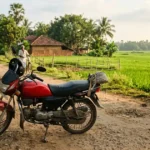 Hero HF Deluxe — স্মার্টফোনের চেয়েও কম দামে ৭০ kmpl মাইলেজের বাইক! EMI মাত্র ₹১,০৫০, দাম, ভ্যারিয়েন্ট ও তুলনা ২০২৬